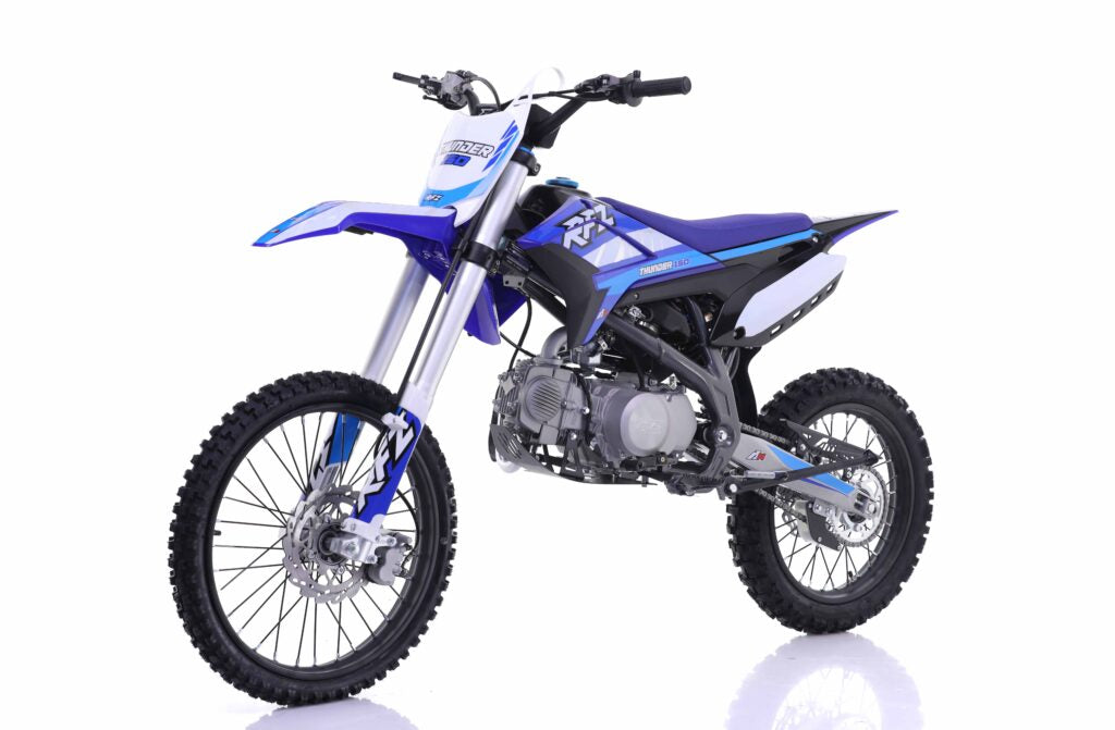 Blue and black dirt bike on a white background