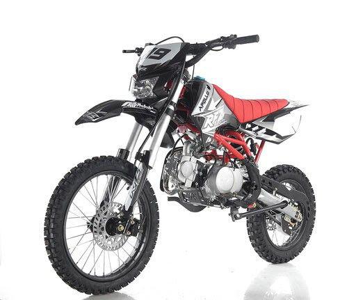 Red and black dirt bike on a white background