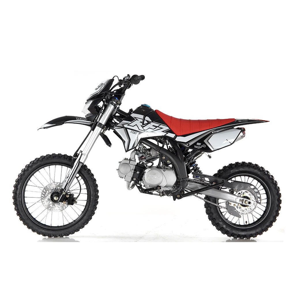 Apollo X19 125cc black dirt bike with headlight — compact off-road motorcycle with black fairings, electric start, and front lighting for night rides.