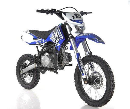 Apollo X19 125cc blue dirt bike with headlight — off-road trail bike built for youth and adults, showing blue plastics, rugged frame, and front light.